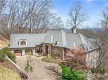 EXQUISITE CUSTOM BUILT HOME WITH SPECTACULAR MOUNTAIN VIEWS