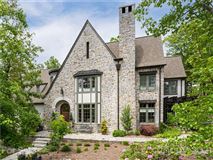 SPACIOUS LIGHT-FILLED STONE AND STUCCO HOME