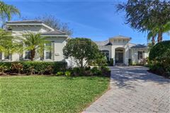 PEACEFUL, NATURAL BEAUTY SURROUNDS THIS ELEGANT RESIDENCE BEAMING WITH SOPHISTICATED DESIGN AND FINISHES