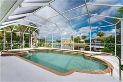 HOME ON AN EXTRA LARGE LOT IN BURNT STORE ISLES