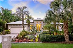 MASTERFULLY-BUILT WITH COUNTLESS CUSTOMIZATIONS, AND BEAUTIFULLY SITED ON A PICTURE-PERFECT STREET