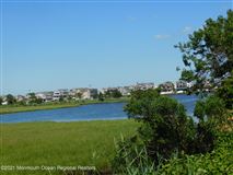 BUILD YOUR DREAM HOME AND ENJOY LAKE VIEWS AND MAGNIFICENT SUNSETS