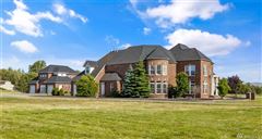 CUSTOM BRICK ESTATE MASTERPIECE WITH TIMELESS STYLE