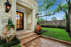 SPANISH COLONIAL LOCATED ON A PROMINENT CORNER LOT