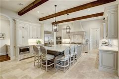 DISTINGUISHED HOME WITH ARCHITECTURAL DETAILS IN PRESTIGIOUS AFTON OAKS