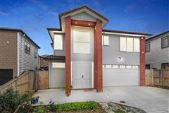 AN EXPANSIVE DREAM HOME WITH A WARM AND INVITING AMBIANCE