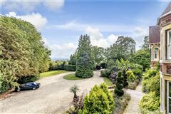 A SUBSTANTIAL VICTORIAN HOUSE AND COACH HOUSE WITH GARDENS OF ABOUT 1.5 ACRES