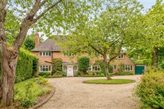LIGHT-FILLED HOME IN A HIGHLY SOUGHT AFTER LOCATION