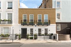RARE THREE-STORY HOME IN SOUGHT AFTER CHELSEA LOCATION