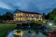 SUBSTANTIAL HOME IN PEACEFUL SETTING