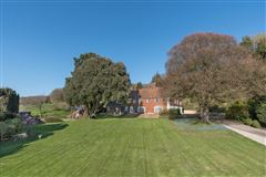 A CHARMING COUNTRY HOUSE OF SOME DISTINCTION, SET IN PRIVATE LOCATION IN STUNNING GARDENS