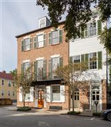 EXCLUSIVE TOP-FLOOR CONDOMINIUM WITH A PRIVATE PIAZZA OFFERING GREAT VIEWS