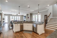 STYLE AND QUALITY ABOUNDS IN THIS INCREDIBLE CUSTOM HOME