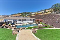 GORGEOUS HOME IN A PREMIER GATED COMMUNITY WITH PRIVATE COURTYARD ACCESS