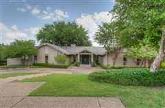 ONE STORY HOME IN A PRIVATE SETTING