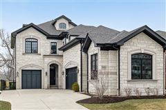 EXCEPTIONAL HOME OVERLOOKING THE LUSH LANDSCAPE OF THE COUNTRY CLUB