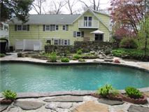 GRACIOUS OASIS ON A FULL TRANQUIL ACRE, WITH IN-GROUND HEATED POOL