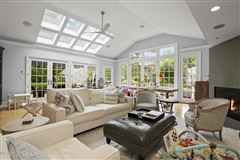 SPECTACULAR SUN LIT HOME WITH BEAUTIFUL WRAP-AROUND MAHOGANY DECK