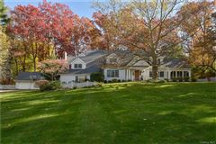 A STUNNING EXECUTIVE CENTER HALL COLONIAL