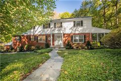 STYLISHLY UPDATED BRICK AND SHINGLE COLONIAL