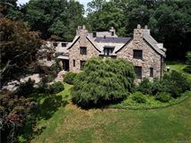 STORYBOOK STONE TUDOR MANOR