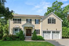 SPACIOUS SUN FILLED COLONIAL IN A BELOVED NEIGHBORHOOD