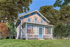 RELOCATED AND RENOVATED TRADITIONAL HOME ON A HILL