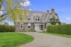 PERFECTLY SITED ON 3.7 WATERFRONT ACRES