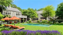 A BEAUTIFULLY LANDSCAPED FOUR-ACRE PROPERTY