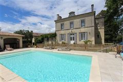TWO IMPECCABLY RENOVATED LARGE HOUSES