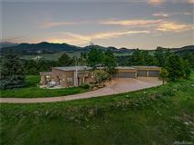 RARE CONTEMPORARY HOME THAT OFFERS GREAT CITY AND MOUNTAINSCAPE VIEWS