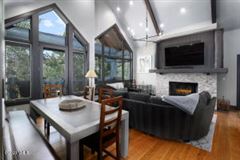 SPACIOUS, BEAUTIFULLY FURNISHED TWO-LEVEL FLOOR PLAN