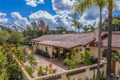 CUSTOM HACIENDA WITH UNIQUE SPANISH CHARM