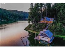 ENCHANTING BOAT ACCESS-ONLY LAKEFRONT CUSTOM-BUILT ESTATE
