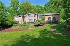SPECTACULAR OPEN FLOOR PLAN WITH A LUXURIOUS OWNER SUITE