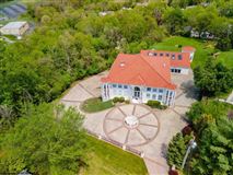 AN EXCEPTIONAL CUSTOM BUILT HOME WITH DISTINCTION
