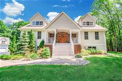 EXQUISITE WATERFRONT HOME WITH SEPARATE CARRIAGE HOUSE