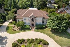 CUSTOM HOME WITH TRADITIONAL ELEGANCE
