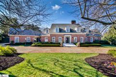 CUSTOM HOME WITH UPDATED DESIGNS THROUGHOUT