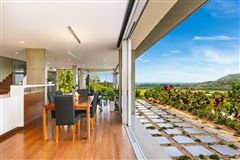 EXCEPTIONAL HIGH QUALITY HOME ELEVATED ABOVE THE SURROUNDING LANDSCAPE