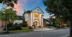 GREEK REVIVAL STUCCO LOADED WITH HIGH-END TOUCHES IN RIVER RANCH