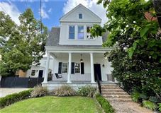 LOVELY UPTOWN HOME WITH CLASSIC ARCHITECTURAL DETAILING THROUGHOUT