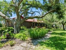 COZY FARMHOUSE ON FIFTEEN TRANQUIL ACRES IN LAKE CHARLES
