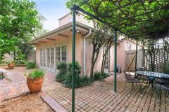 HOME STEPS FROM AUDUBON PARK