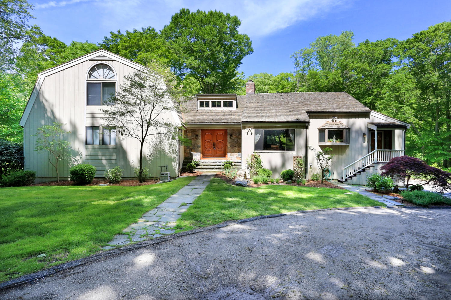 IMPRESSIVE COLONIAL ON A SECLUDED ACRE