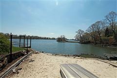 WATERFRONT WITH ITS OWN PRIVATE SANDY BEACH