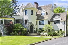 PRIVATE LAKEFRONT FIVE-BEDROOM ENGLISH TUDOR