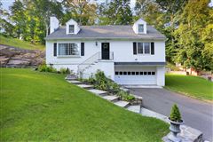 RECENTLY UPDATED CAPE COD HOME HIGH ON A KNOLL