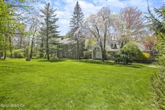 CHARMING STONE HOME ON COVETED STREET