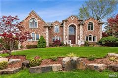 MAGNIFICENT PRIVATE BRICK COLONIAL ON EAST HILL OF CLOSTER